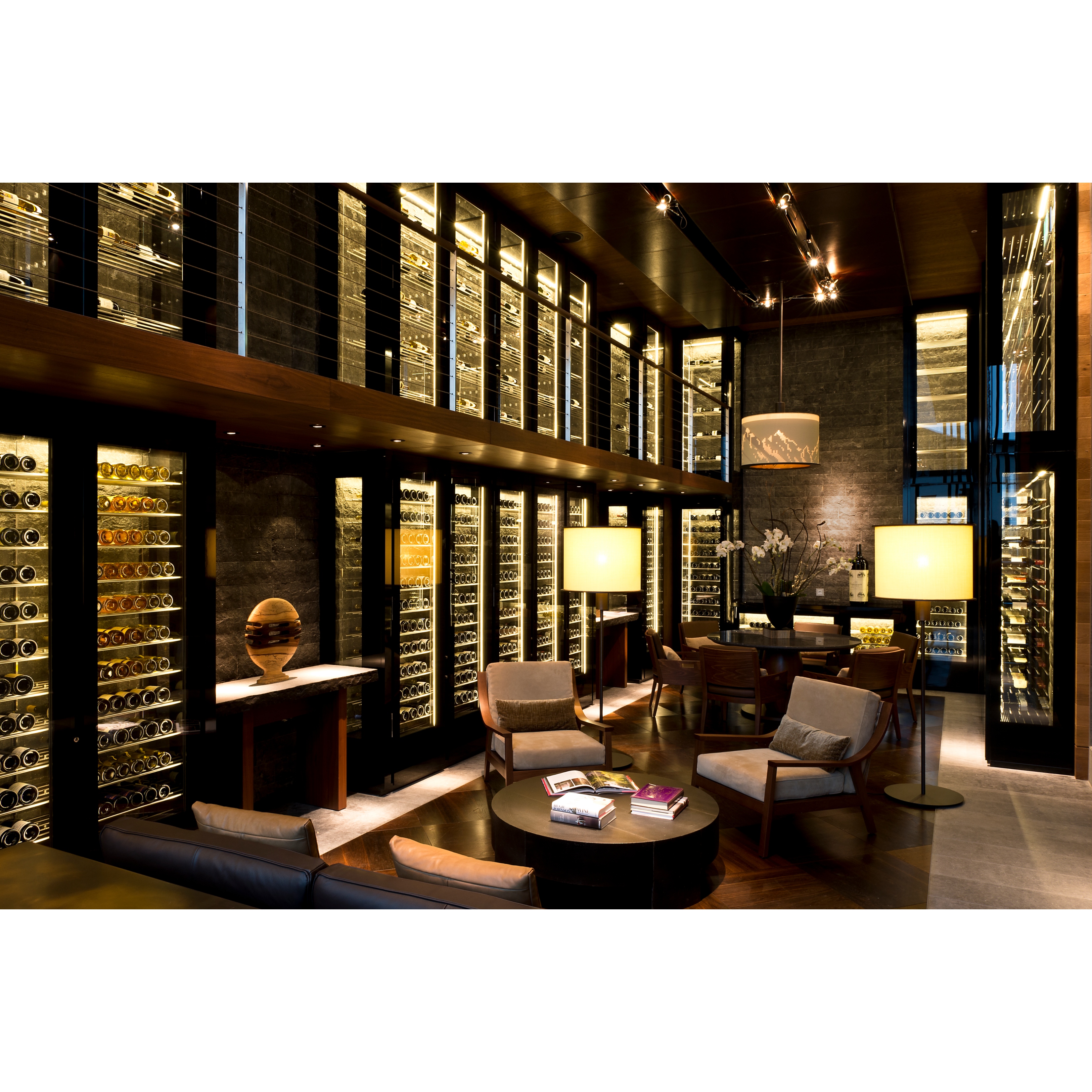 the wine library seating area inside The chedi adnermatt swiss alps hotel