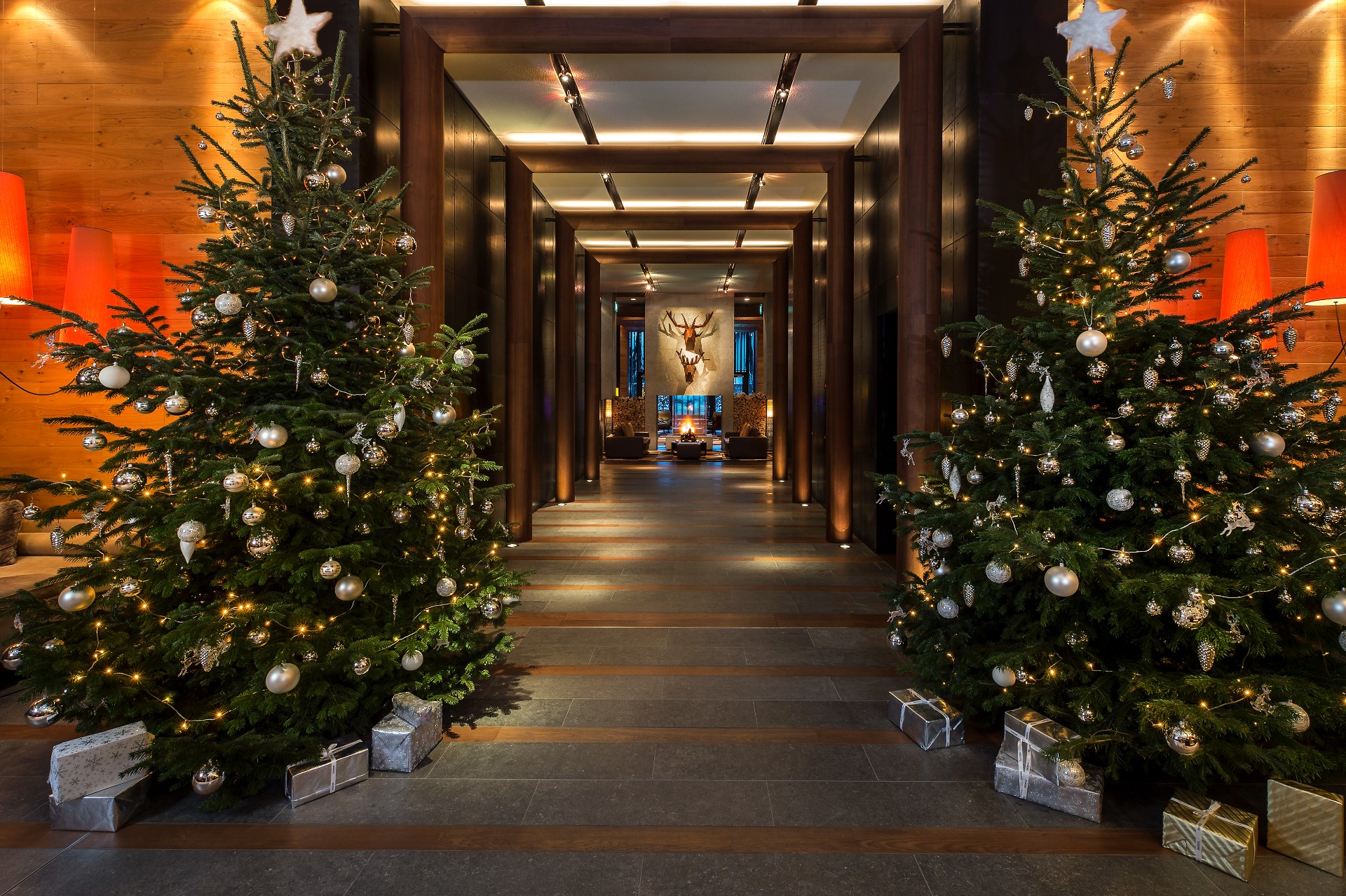 A Hallway With Christmas Trees