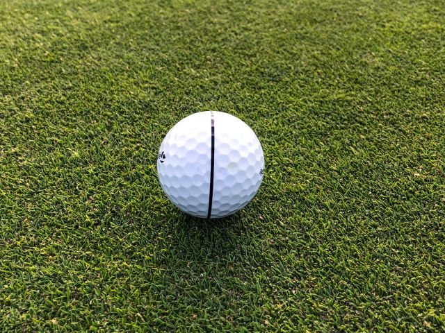 A Golf Ball On The Grass