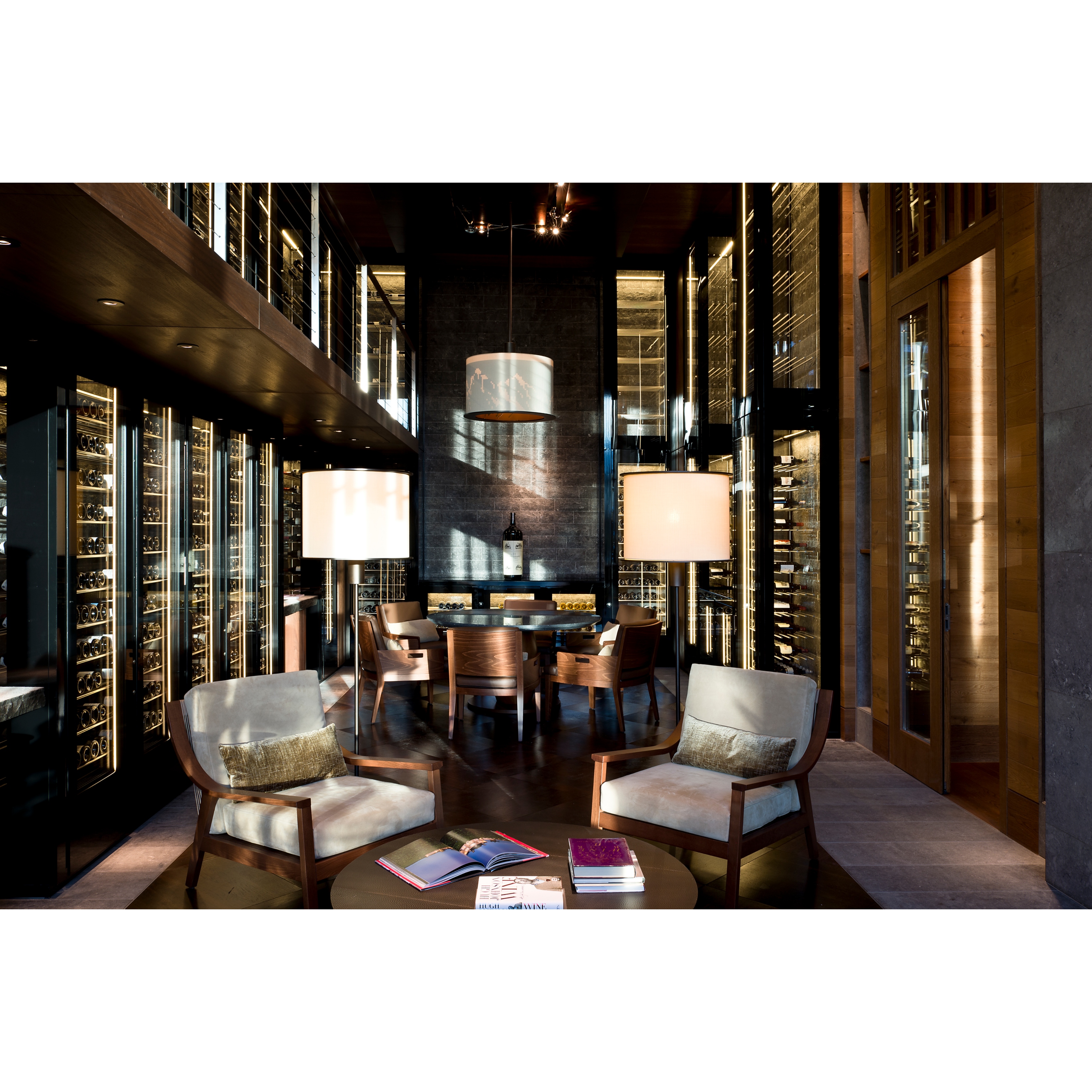 winery and seating area inside the wine library at the chedi andermatt swiss alps