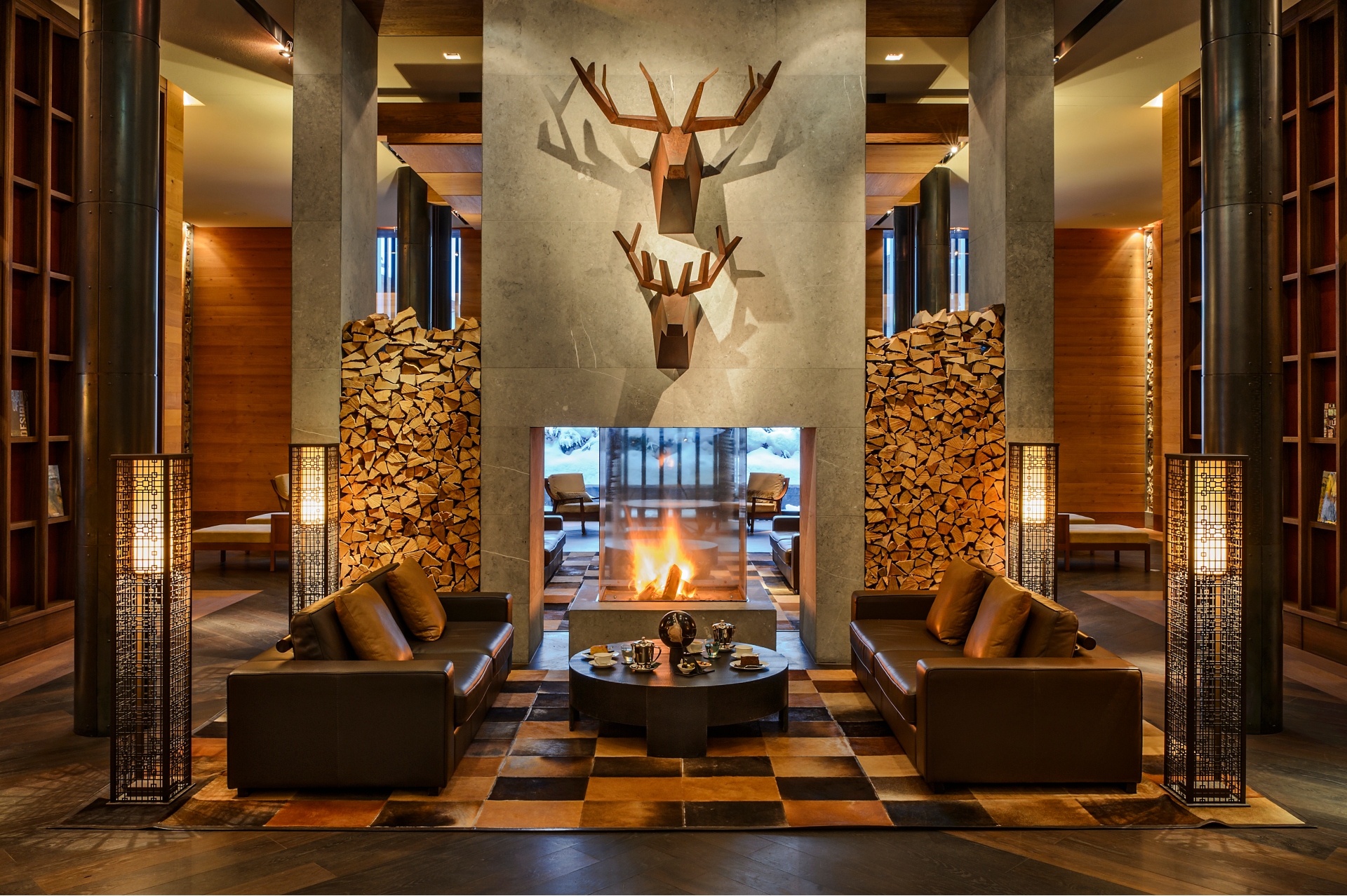 The library overview And A Fireplace at The Chedi Andermatt